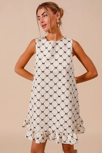 Texture Bow Printed Ruffle Mini Dress-Chic black & white bow print mini dress with a playful ruffle hem. Sleeveless & lightweight for effortless summer style, perfect for day or night outings.-Reef Love Boho-Chic Boutique