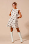 Texture Bow Printed Ruffle Mini Dress-Chic black & white bow print mini dress with a playful ruffle hem. Sleeveless & lightweight for effortless summer style, perfect for day or night outings.-Reef Love Boho-Chic Boutique