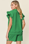Women's green Textured, stretchy, and comfy flounce sleeve top and drawstring shorts set. This set is perfect for a travel day, or out running around town, the set can also be dressed up with heels and accessories for versatility while on the go - Reef Love