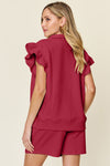 Women's Textured, stretchy, and comfy flounce sleeve top and drawstring shorts set. This set is perfect for a travel day, or out running around town, the set can also be dressed up with heels and accessories for versatility while on the go - Reef Love