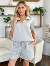 Women's Textured, stretchy, and comfy flounce sleeve top and drawstring shorts set. This set is perfect for a travel day, or out running around town, the set can also be dressed up with heels and accessories for versatility while on the go - Reef Love