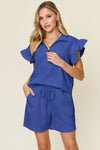 Women's Blue Textured, stretchy, and comfy flounce sleeve top and drawstring shorts set. This set is perfect for a travel day, or out running around town, the set can also be dressed up with heels and accessories for versatility while on the go - Reef Love