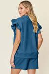 Women's Textured, stretchy, and comfy flounce sleeve top and drawstring shorts set. This set is perfect for a travel day, or out running around town, the set can also be dressed up with heels and accessories for versatility while on the go - Reef Love