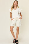 Women's Textured, stretchy, and comfy flounce sleeve top and drawstring shorts set. This set is perfect for a travel day, or out running around town, the set can also be dressed up with heels and accessories for versatility while on the go - Reef Love