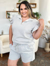 Women's Textured, stretchy, and comfy flounce sleeve top and drawstring shorts set. This set is perfect for a travel day, or out running around town, the set can also be dressed up with heels and accessories for versatility while on the go - Reef Love