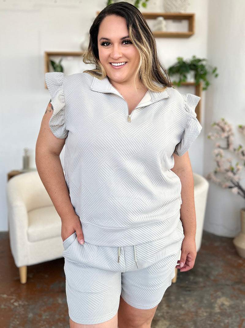 Women's Textured, stretchy, and comfy flounce sleeve top and drawstring shorts set. This set is perfect for a travel day, or out running around town, the set can also be dressed up with heels and accessories for versatility while on the go - Reef Love