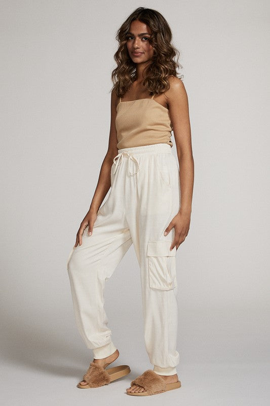 Textured Satin Cargo pPants-Textured satin cargo pants with pockets, ribbed cuffs, and elastic waist. Dress them up or down for effortless everyday edge and comfort.-Reef Love