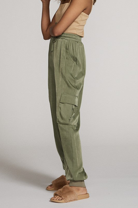 Textured Satin Cargo pPants-Textured satin cargo pants with pockets, ribbed cuffs, and elastic waist. Dress them up or down for effortless everyday edge and comfort.-Reef Love