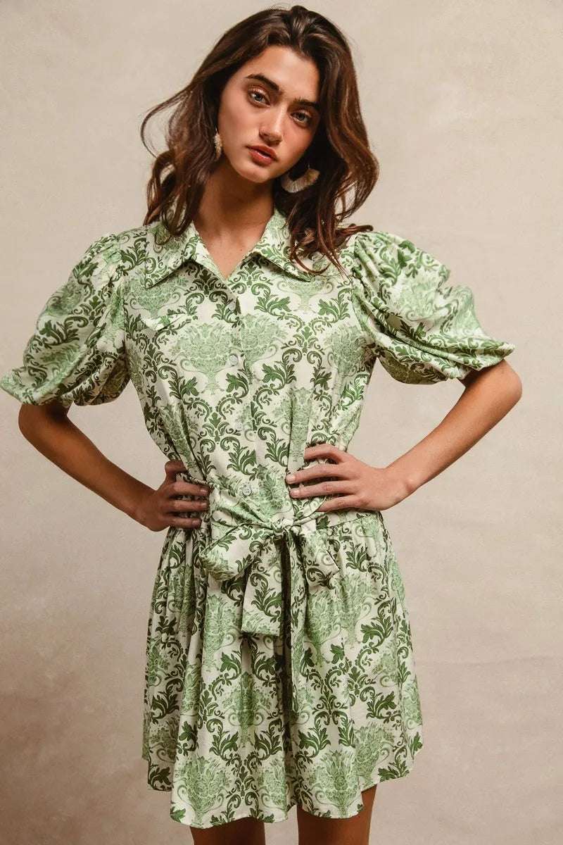 Tied Green Floral Mini Shirt Dress-Add a playful twist to your everyday look with this tied floral short sleeve mini shirt dress. Featuring a classic button-down front and a flattering waist tie.-Reef Love Boho-Chic Boutique