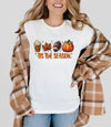 Tis The Season Football Graphic Tee-’Tis The Season Football Graphic Tee. Soft Bella + Canvas fall t-shirt with latte, leaf, football & pumpkin design. Perfect for layering under flannels this autumn.-Reef Love