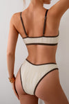 Shop Two Pieces Pleated Cut Out High Cut Bikini-High-cut two-piece bikini with pleated texture and bold cut-outs. Flattering and modern—perfect for beach vacations, pool parties, or resort wear.-available at Reef Love online boho-chic boutique