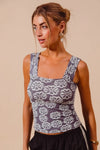 Shop Two Tone Floral Seamless Tank Top-Soft & stretchy floral cami tank with a square neckline & adjustable straps. A flattering seamless fit perfect for layering or wearing solo. Feminine & versatile.-available at Reef Love online boho-chic boutique