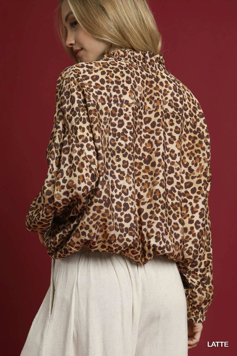 Shop Umgee Leopard Print Balloon Sleeve Blouse-Channel your wild side with this Leopard Print Balloon Sleeve Blouse. The striking print combined with the balloon sleeves creates an on-trend look. -available at Reef Love online boho-chic boutique