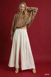 Shop Umgee Leopard Print Balloon Sleeve Blouse-Channel your wild side with this Leopard Print Balloon Sleeve Blouse. The striking print combined with the balloon sleeves creates an on-trend look. -available at Reef Love online boho-chic boutique