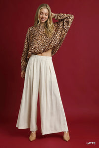 Shop Umgee Leopard Print Balloon Sleeve Blouse-Channel your wild side with this Leopard Print Balloon Sleeve Blouse. The striking print combined with the balloon sleeves creates an on-trend look. -available at Reef Love online boho-chic boutique