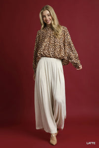 Shop Umgee Leopard Print Balloon Sleeve Blouse-Channel your wild side with this Leopard Print Balloon Sleeve Blouse. The striking print combined with the balloon sleeves creates an on-trend look. -available at Reef Love online boho-chic boutique