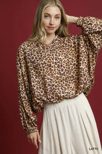 Shop Umgee Leopard Print Balloon Sleeve Blouse-Channel your wild side with this Leopard Print Balloon Sleeve Blouse. The striking print combined with the balloon sleeves creates an on-trend look. -available at Reef Love online boho-chic boutique