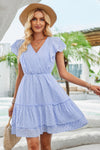 Woman wearing Ruffle Trim V Neck Fit Dress-Effortlessly stylish and flattering, this dress features ruffle trim and a deep V-neckline for a touch of romance. Fitted silhouette enhances your natural shape