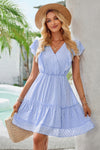 Woman wearing Ruffle Trim V Neck Fit Dress-Effortlessly stylish and flattering, this dress features ruffle trim and a deep V-neckline for a touch of romance. Fitted silhouette enhances your natural shape