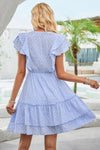 Woman wearing Ruffle Trim V Neck Fit Dress-Effortlessly stylish and flattering, this dress features ruffle trim and a deep V-neckline for a touch of romance. Fitted silhouette enhances your natural shape