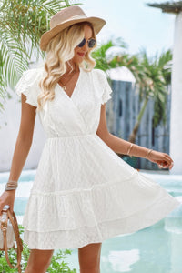 Woman wearing Ruffle Trim V Neck Fit Dress-Effortlessly stylish and flattering, this dress features ruffle trim and a deep V-neckline for a touch of romance. Fitted silhouette enhances your natural shape