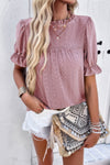 Woman wearing Embroidery Ruffle Sleeve Loose Fit Blouse-Add a touch of charm to your everyday look with this round neck embroidered shirt, featuring ruffle sleeves and a relaxed silhouette and intricate embroidery.