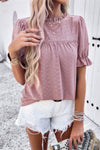 Woman wearing Embroidery Ruffle Sleeve Loose Fit Blouse-Add a touch of charm to your everyday look with this round neck embroidered shirt, featuring ruffle sleeves and a relaxed silhouette and intricate embroidery.