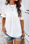Woman wearing Embroidery Ruffle Sleeve Loose Fit Blouse-Add a touch of charm to your everyday look with this round neck embroidered shirt, featuring ruffle sleeves and a relaxed silhouette and intricate embroidery.