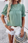 Woman wearing Embroidery Ruffle Sleeve Loose Fit Blouse-Add a touch of charm to your everyday look with this round neck embroidered shirt, featuring ruffle sleeves and a relaxed silhouette and intricate embroidery.