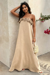 Woman wearing Flower Trim Spaghetti Strap Maxi Dress-Embrace a romantic and breezy vibe with this flower trim sleeveless dress, designed to turn heads with its ruffled, maxi silhouette. Breathable comfort.