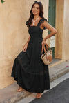 Woman wearing Lace Patchwork Textured Maxi Dress-Elegant and effortlessly wearable, this solid sleeveless dress features delicate lace patchwork and a subtle textured finish for added dimension. 