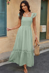 Woman wearing Lace Patchwork Textured Maxi Dress-Elegant and effortlessly wearable, this solid sleeveless dress features delicate lace patchwork and a subtle textured finish for added dimension. 