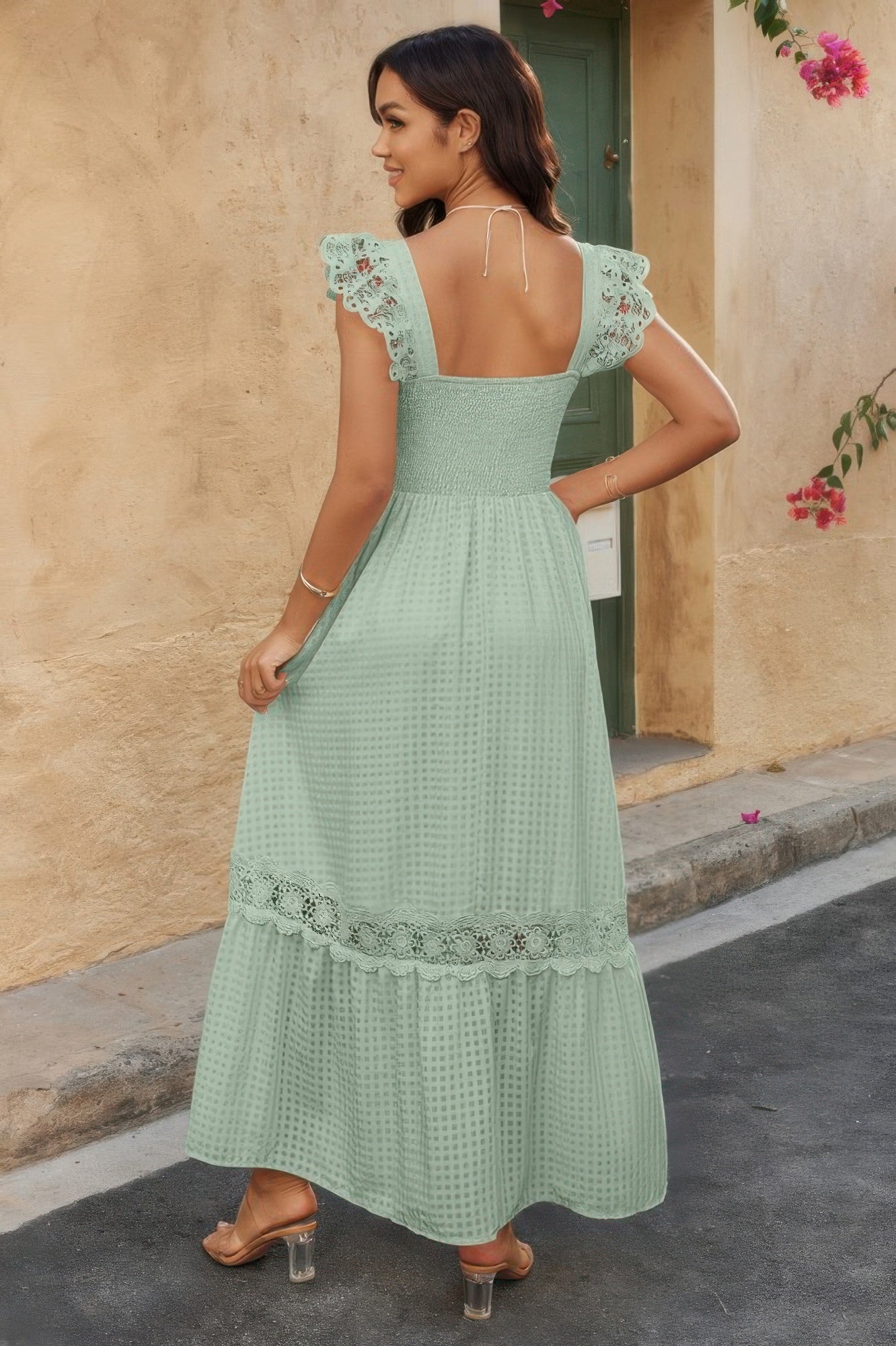 Woman wearing Lace Patchwork Textured Maxi Dress-Elegant and effortlessly wearable, this solid sleeveless dress features delicate lace patchwork and a subtle textured finish for added dimension. 
