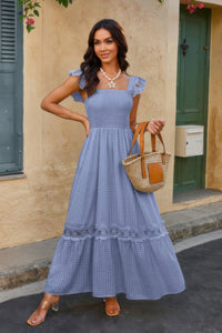 Woman wearing Lace Patchwork Textured Maxi Dress-Elegant and effortlessly wearable, this solid sleeveless dress features delicate lace patchwork and a subtle textured finish for added dimension. 