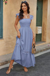 Woman wearing Lace Patchwork Textured Maxi Dress-Elegant and effortlessly wearable, this solid sleeveless dress features delicate lace patchwork and a subtle textured finish for added dimension. 