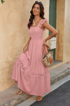 Woman wearing Lace Patchwork Textured Maxi Dress-Elegant and effortlessly wearable, this solid sleeveless dress features delicate lace patchwork and a subtle textured finish for added dimension. 