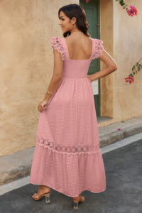 Woman wearing Lace Patchwork Textured Maxi Dress-Elegant and effortlessly wearable, this solid sleeveless dress features delicate lace patchwork and a subtle textured finish for added dimension. 