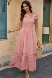 Woman wearing Lace Patchwork Textured Maxi Dress-Elegant and effortlessly wearable, this solid sleeveless dress features delicate lace patchwork and a subtle textured finish for added dimension. 