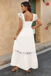 Woman wearing Lace Patchwork Textured Maxi Dress-Elegant and effortlessly wearable, this solid sleeveless dress features delicate lace patchwork and a subtle textured finish for added dimension. 