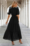 Woman wearing Cut Out Waist Ruffle Hem Puff Sleeves Fit Dress-