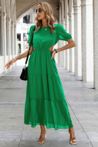 Woman wearing Cut Out Waist Ruffle Hem Puff Sleeves Fit Dress-