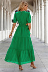 Woman wearing Cut Out Waist Ruffle Hem Puff Sleeves Fit Dress-