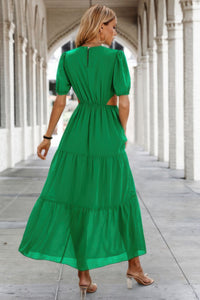 Woman wearing Cut Out Waist Ruffle Hem Puff Sleeves Fit Dress-