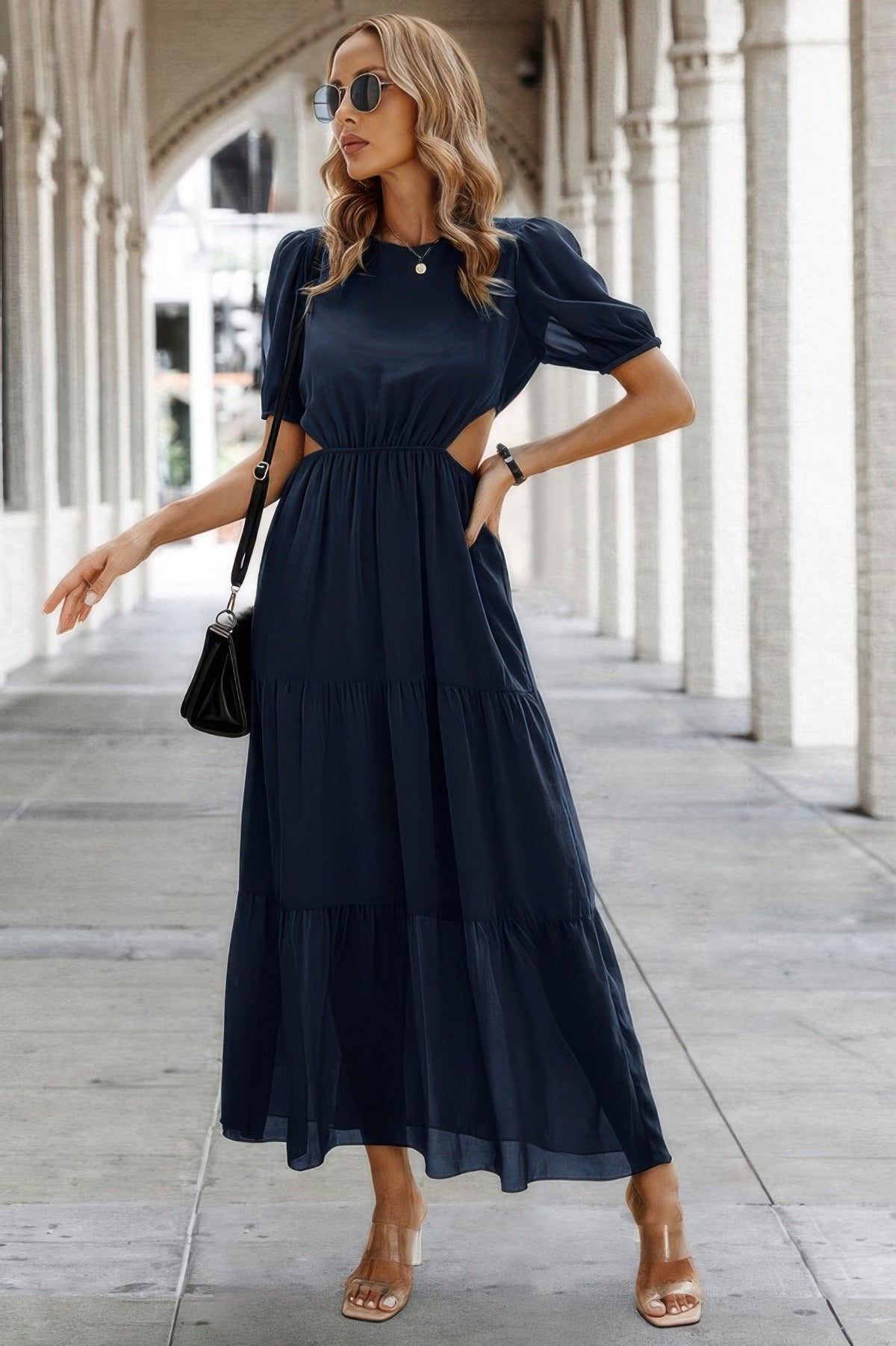 Woman wearing Cut Out Waist Ruffle Hem Puff Sleeves Fit Dress-