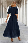 Woman wearing Cut Out Waist Ruffle Hem Puff Sleeves Fit Dress-