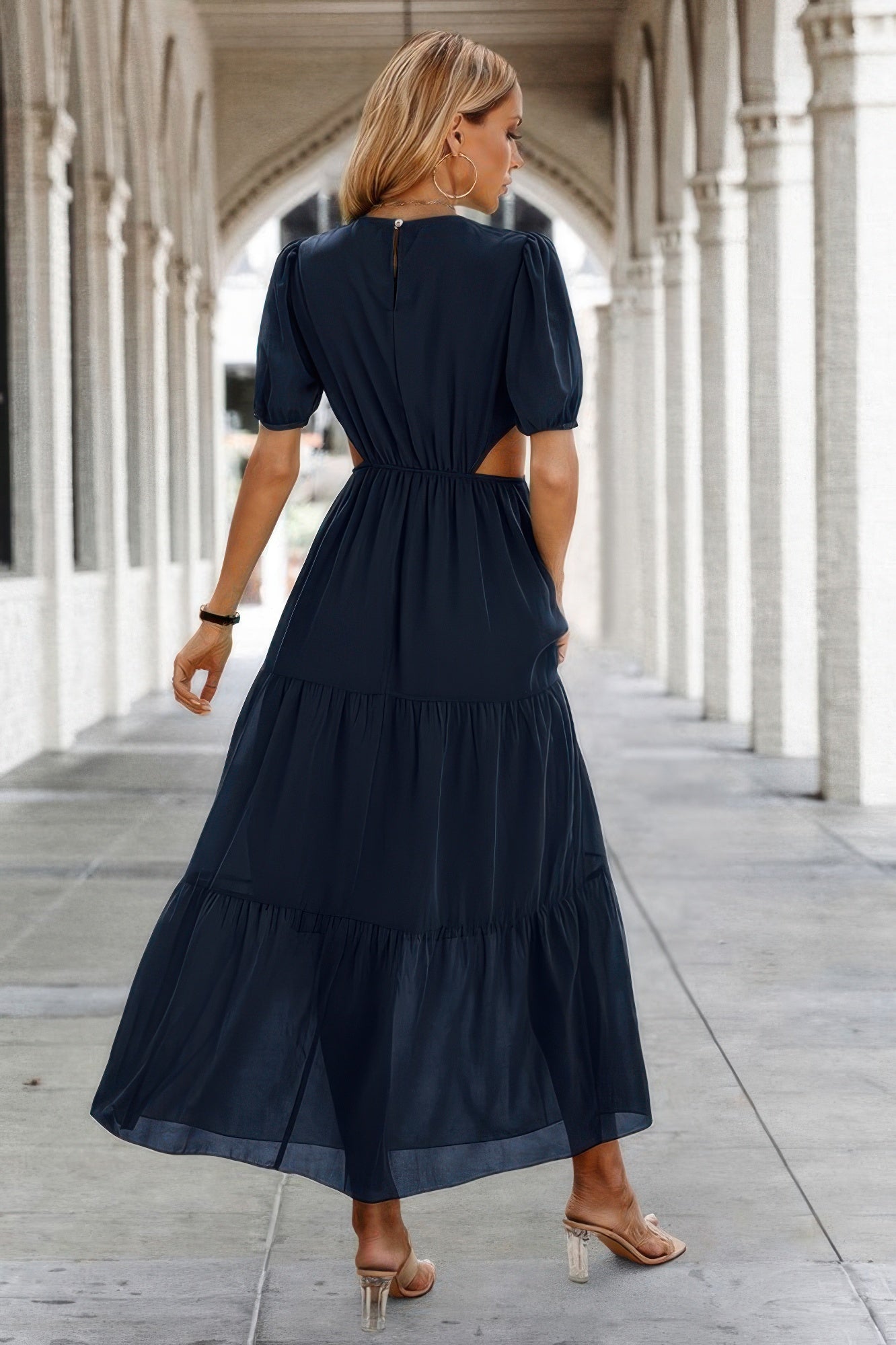 Woman wearing Cut Out Waist Ruffle Hem Puff Sleeves Fit Dress-