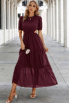 Woman wearing Cut Out Waist Ruffle Hem Puff Sleeves Fit Dress-
