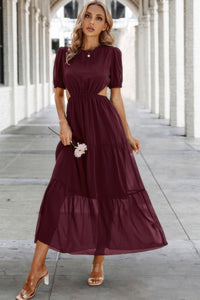 Woman wearing Cut Out Waist Ruffle Hem Puff Sleeves Fit Dress-