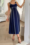 Woman wearing Contrast Binding Linen Blend Maxi Dress-Contrast Binding Linen Blend Maxi Dress - Effortlessly Chic and breezy. Your go-to choice for sunny days, contrast binding that adds a stylish edge.