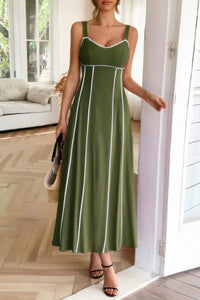 Woman wearing Contrast Binding Linen Blend Maxi Dress-Contrast Binding Linen Blend Maxi Dress - Effortlessly Chic and breezy. Your go-to choice for sunny days, contrast binding that adds a stylish edge.